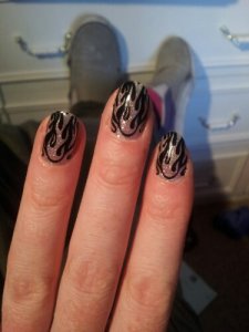 meantime, here are my nails!  Silver flame wraps that I bought in Reykjavic earlier this year.